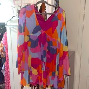 A colorful dress, worn once